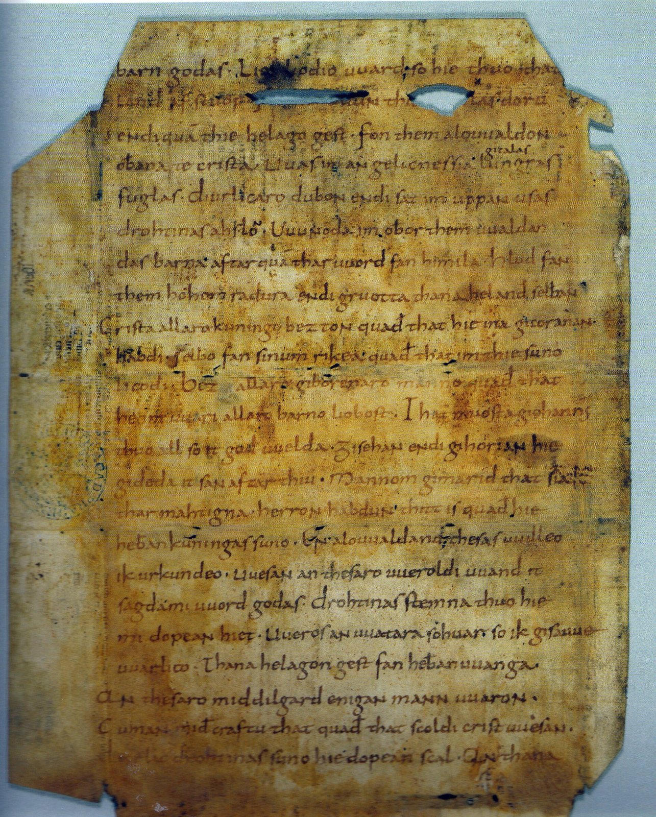 A ninth-century manuscript page of the Heliand in early medieval script.