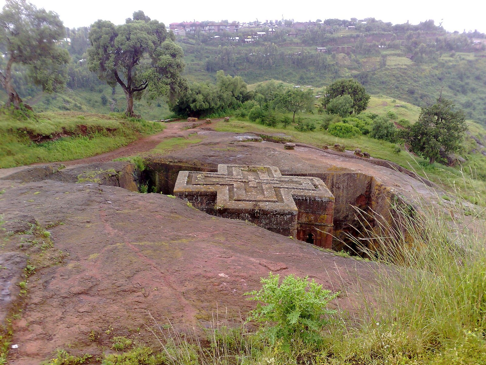 The rock-hewn cross-shaped church of Bete Giyorgis at Lalibela, carved down into the ground.